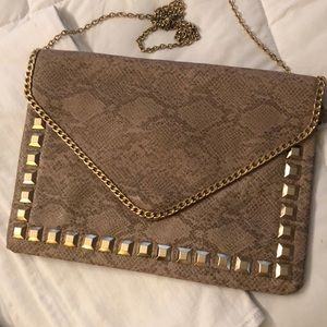 Mock snakeskin envelope studded bag
